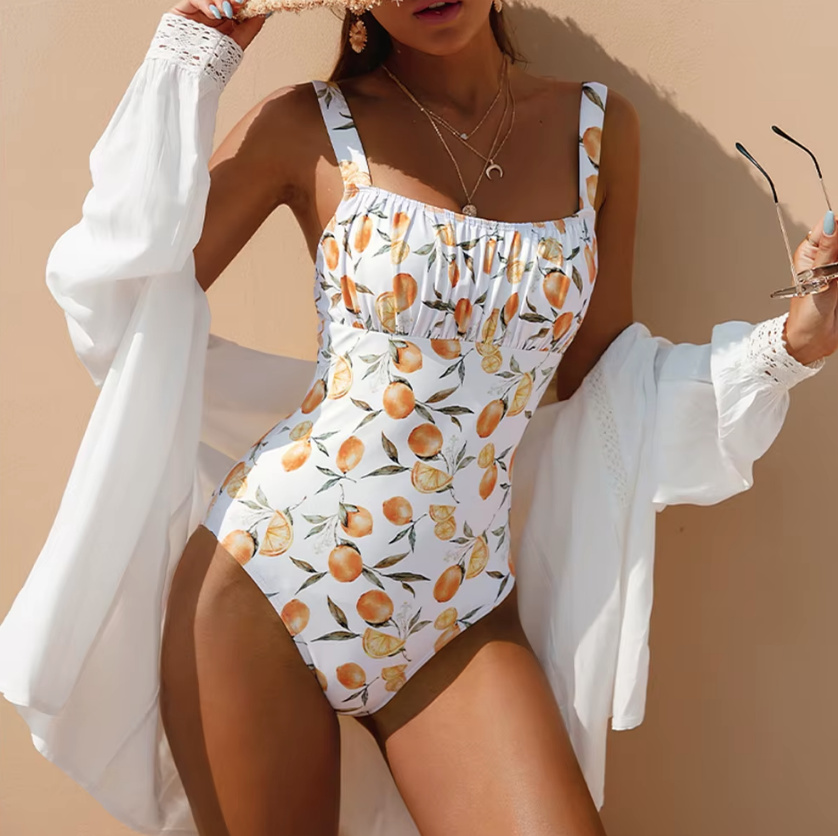Damen Badeanzug Waida in Weiß mit Orangen